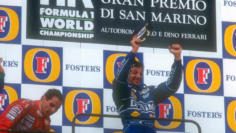 Riccardo Patrese celebrates 1990 San Marino GP win on the podium