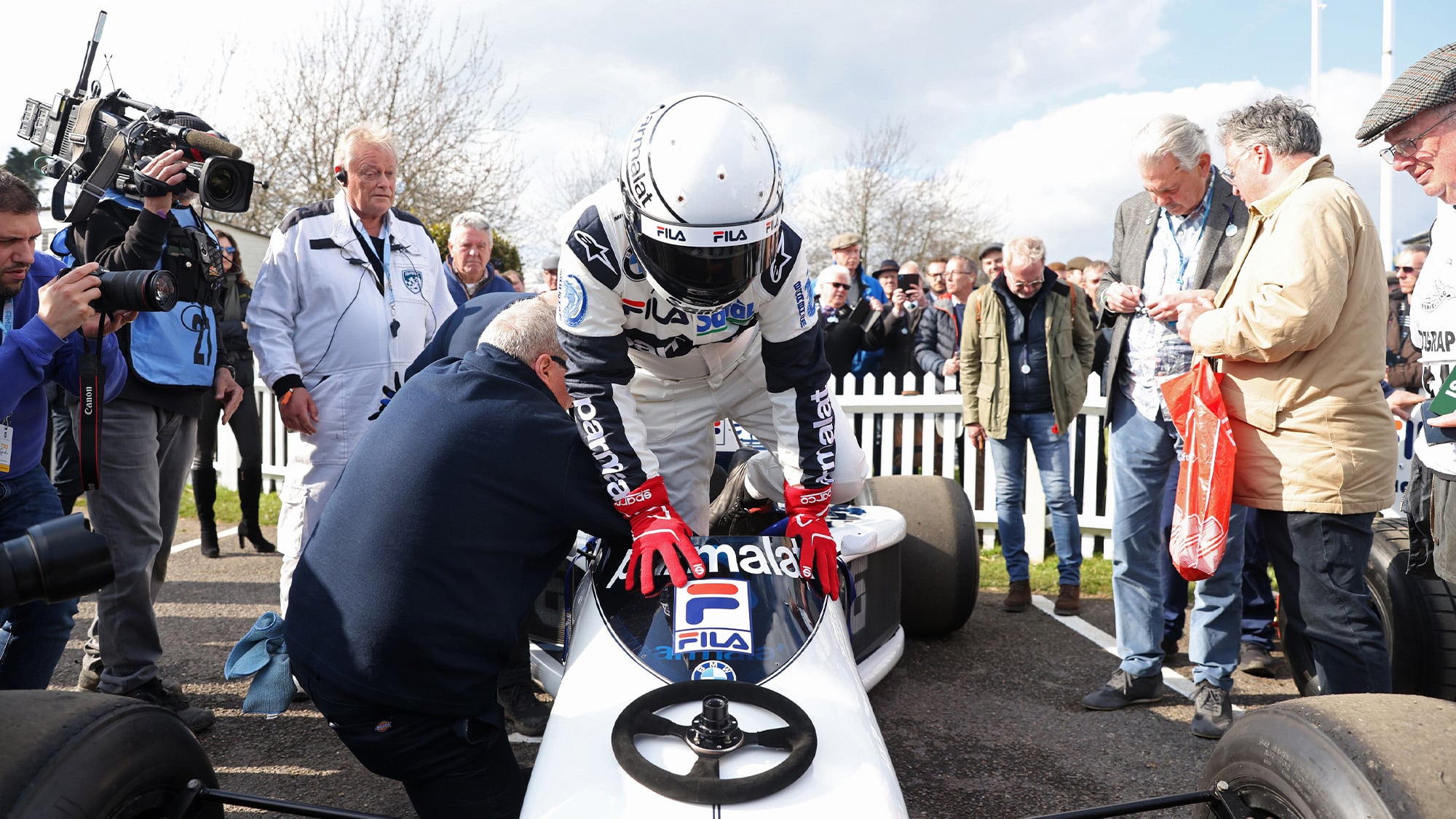 Riccardo Patrese climbs into Brabham BT52 1t 2023 Goodwood Members Meeting