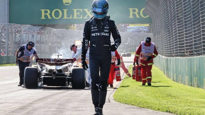 Russell walks away from his failed Mercedes