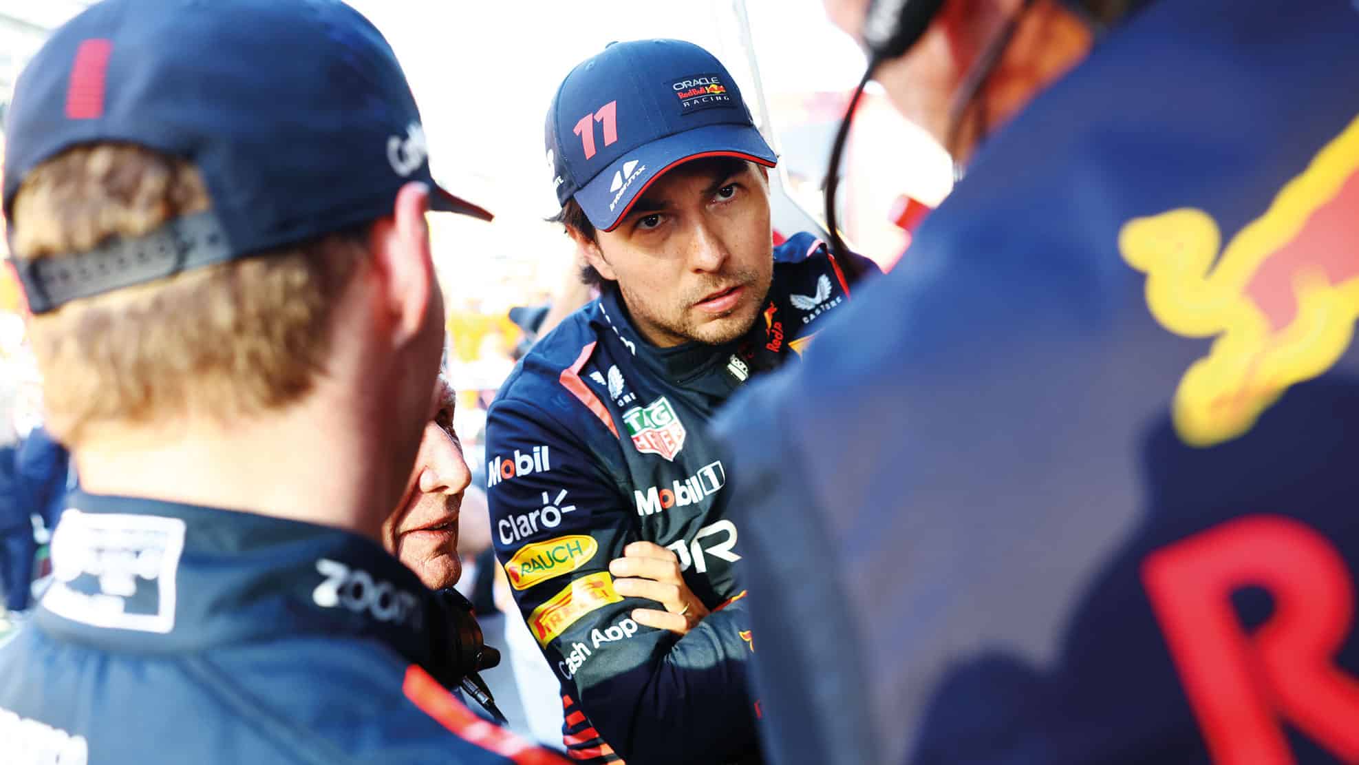 Sergio Perez chats to Red Bull team
