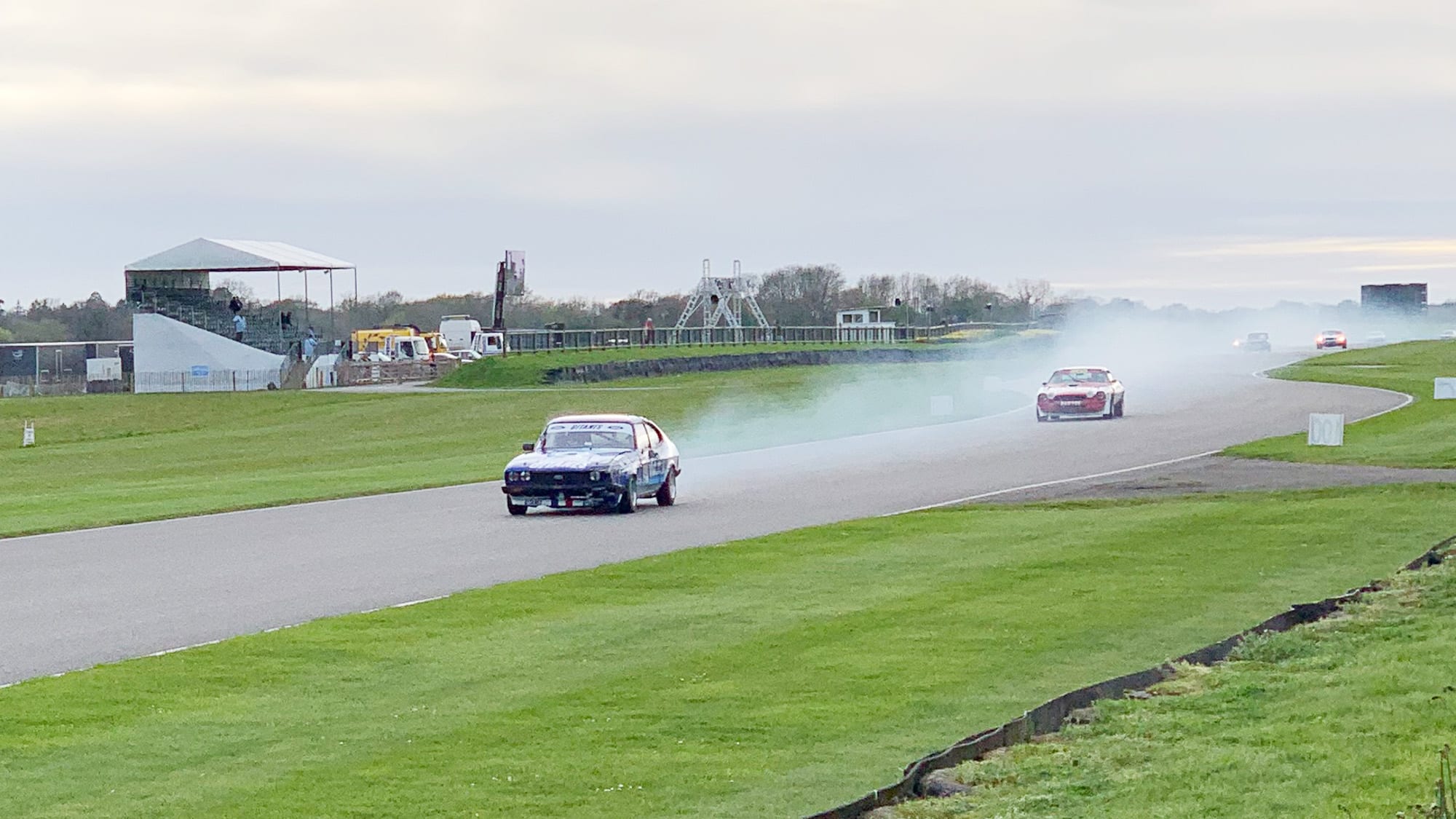 Smoking Ford Capri at Goodwood Members Meeting