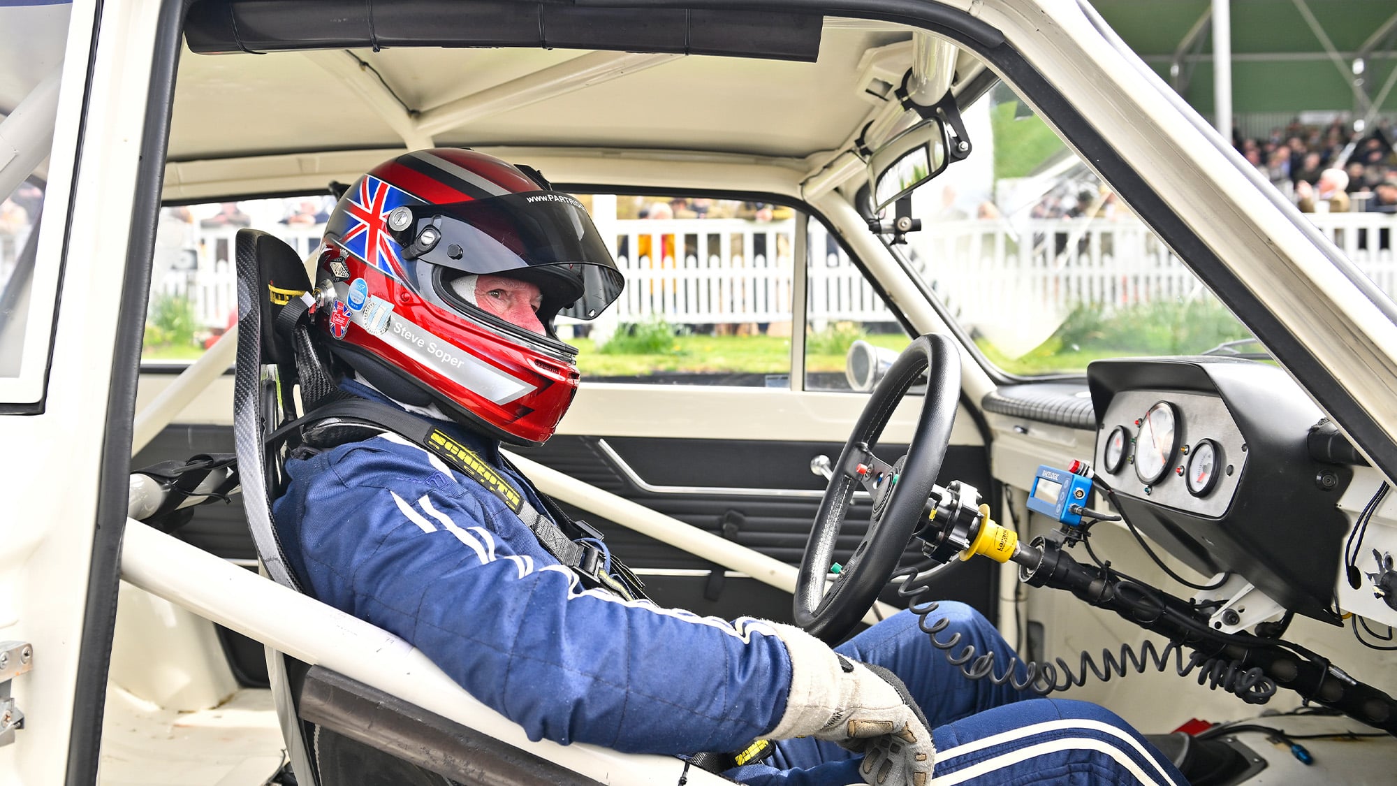 Steve Soper in Lotus Cortina art 2023 Goodwoowd Members' Meeting