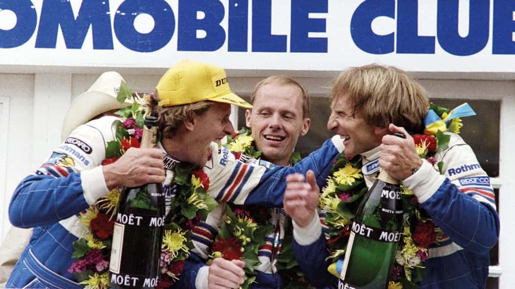 Stuck and Derek Bell celeberate victory