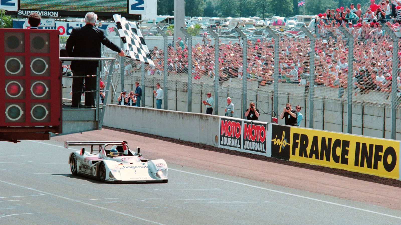 Tom Kristensen crossing the line at 1997 Le Mans