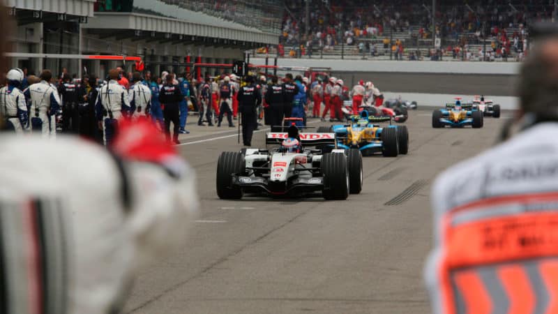 Jenson Button leads Michelin runners down pit lane at 2005 US Grand Prix