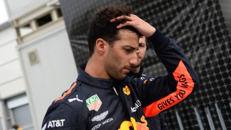 Daniel Ricciardo runs his hands through his hair after crashing with Max Verstappen in the 2018 Azerbaijan Grand Prix
