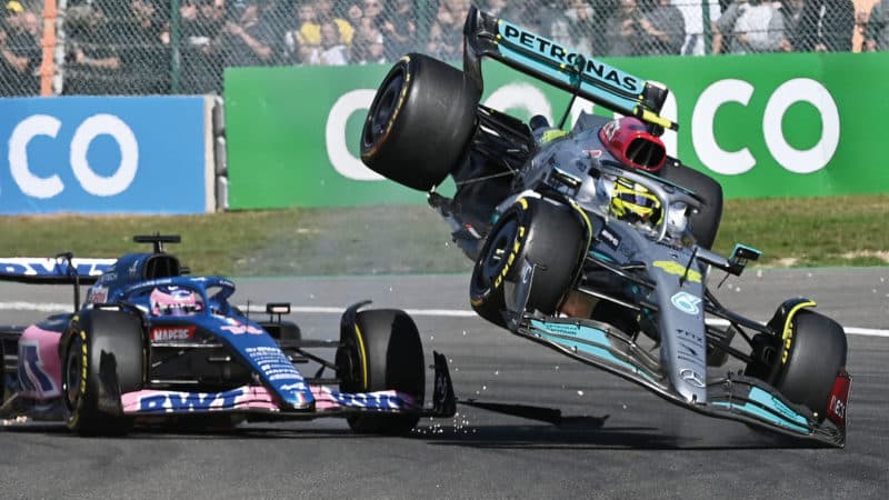 Fernando Alonso and Lewis Hamilton collide