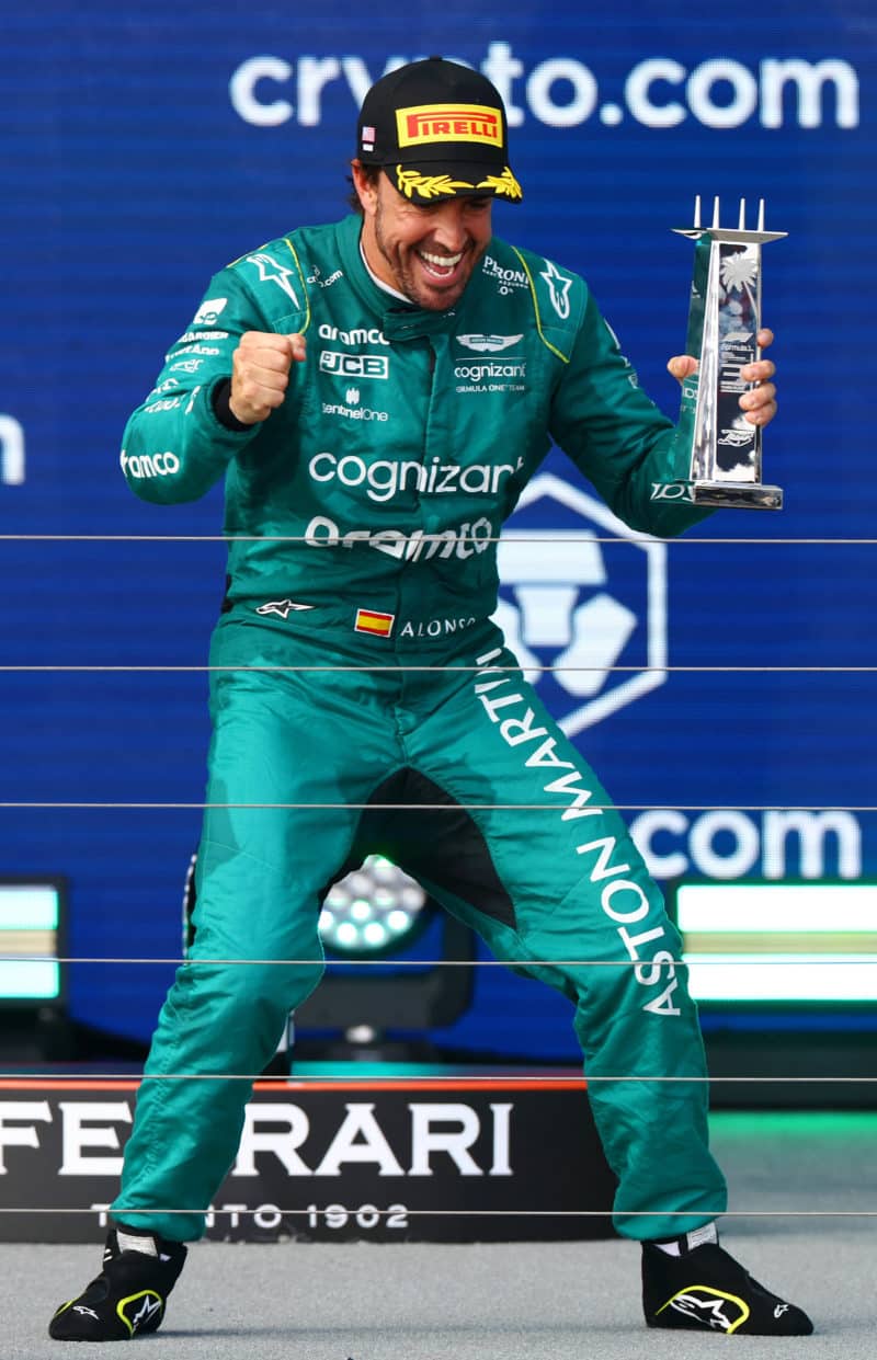Fernando-Alonso-celebrates-thirds-place-in-2023-Miami-GP-with-trophy-on-the-podium