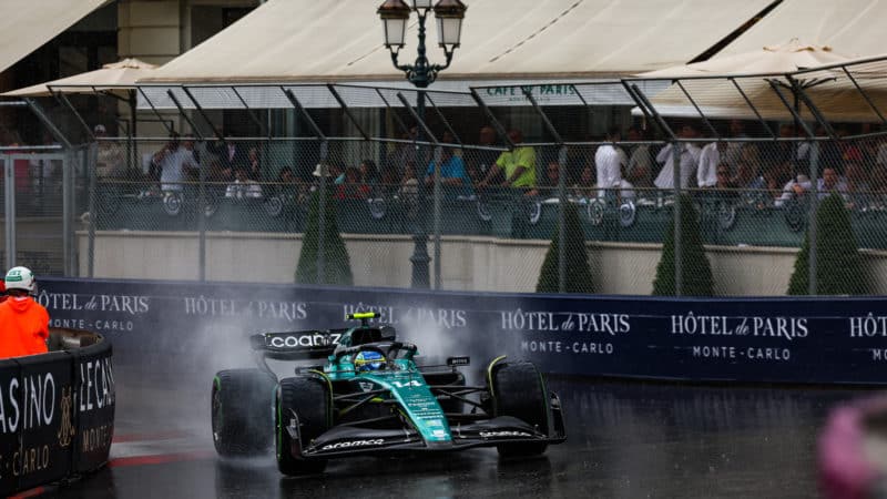 Fernando Alonso drives on wet 2023 Monaco GP circuit