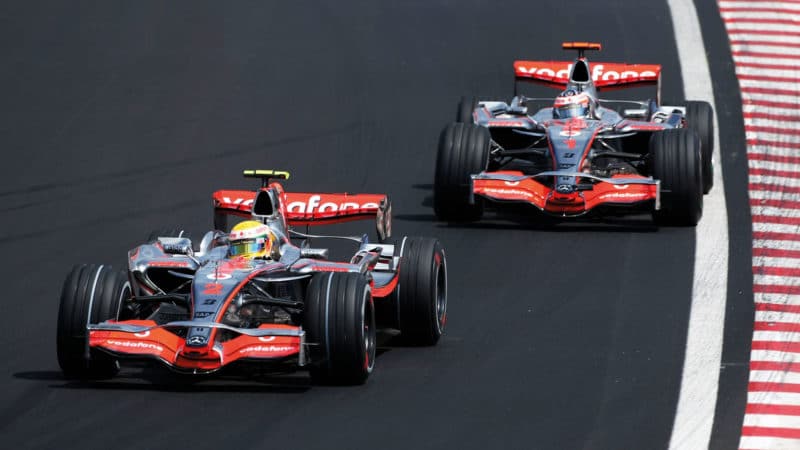 Lewis Hamilton ahead of Fernando Alonso in McLarens