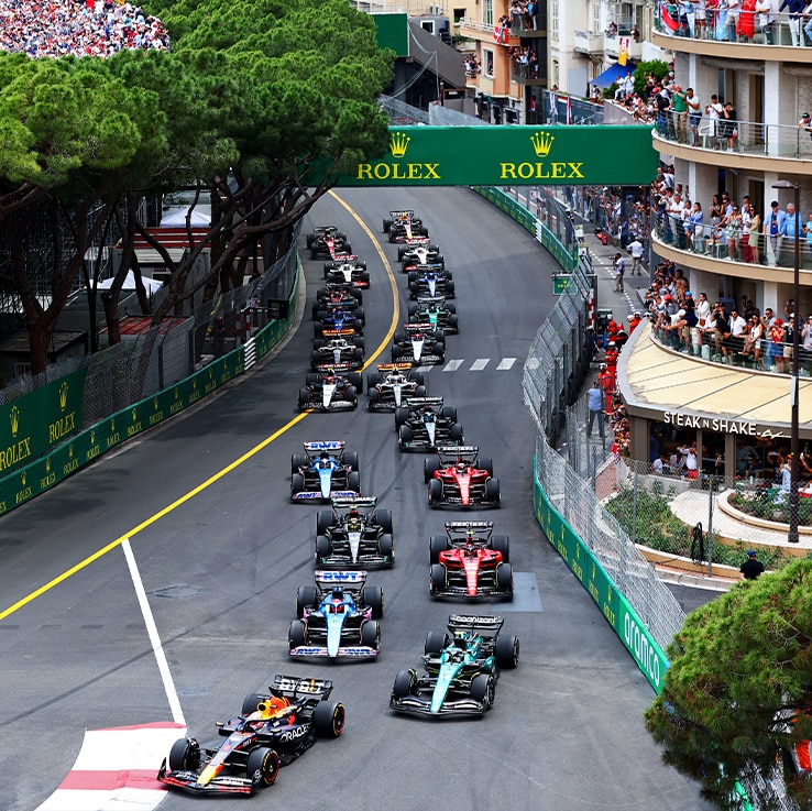 Max Verstappen leads in to Turn 1 at 2023 Monaco GP