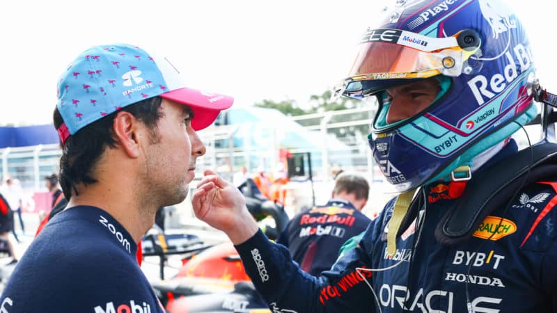 Max Verstappen talks to Sergio Perez after 2023 F1 Miami GP qualifying