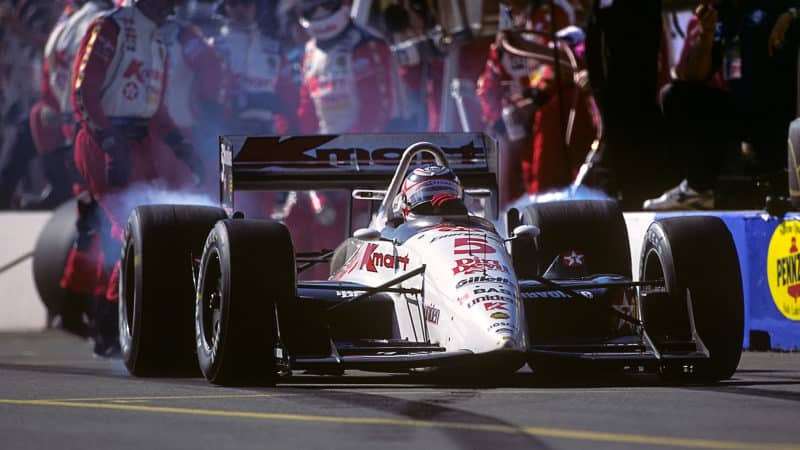 Nigel Mansell exits Surfers Paradise pits in a cloud of tyre smoke in 1993 race