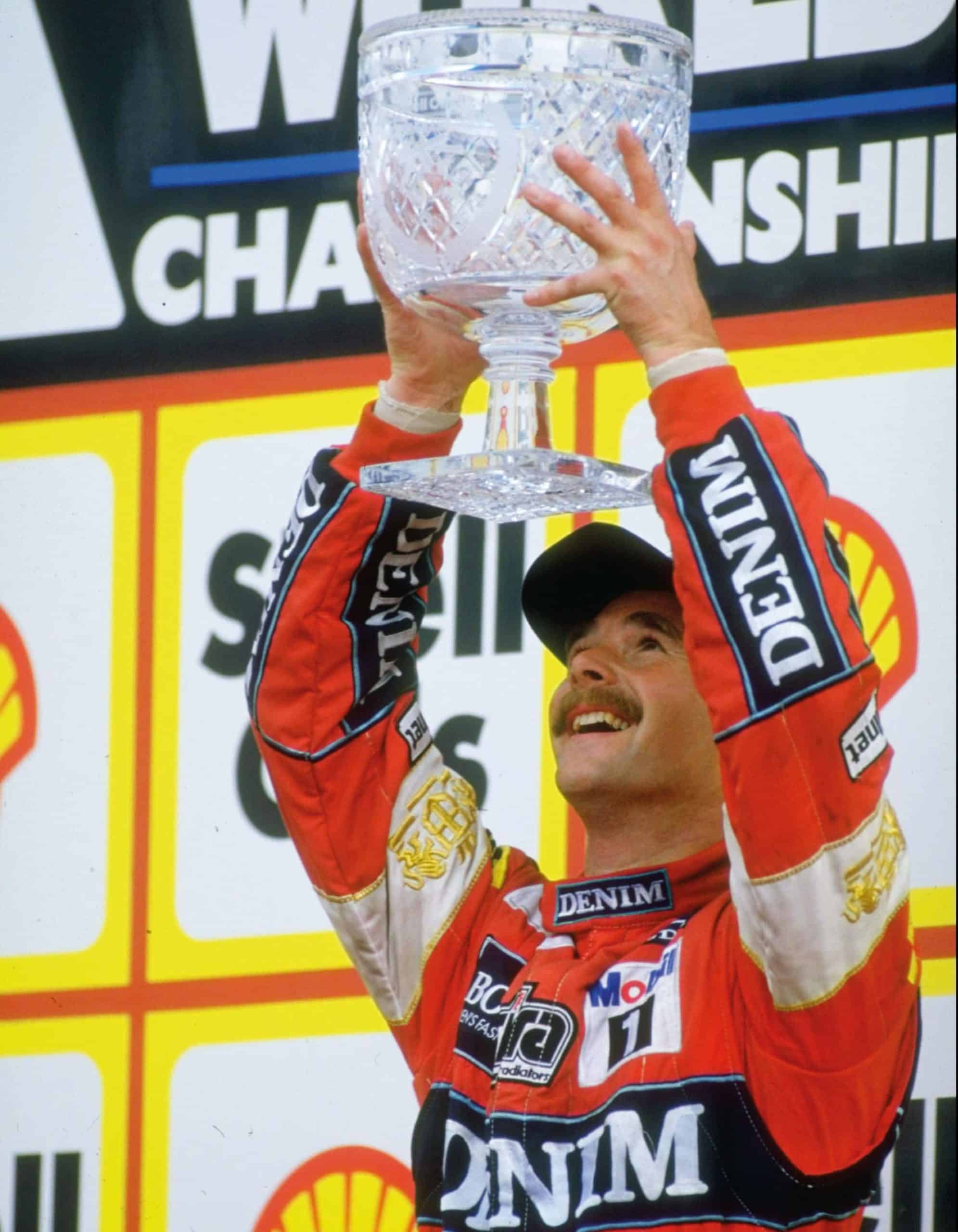 Nigel Mansell on the podium at the British GP