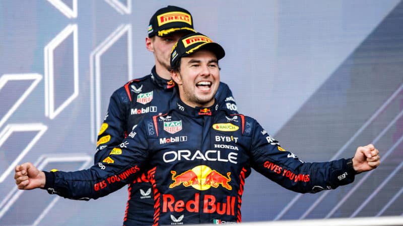 Sergio Perez celebrates 2023 Azerbaijan GP with Max Verstappen in background