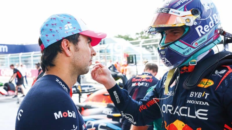 Sergio Perez chats with Max Verstappen