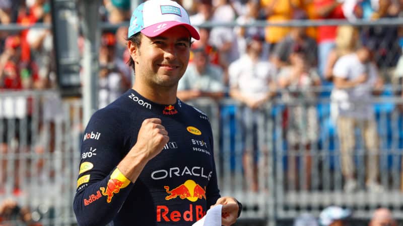 Sergio Perez pumps his fist after winning pole in the 2023 F1 Miami GP