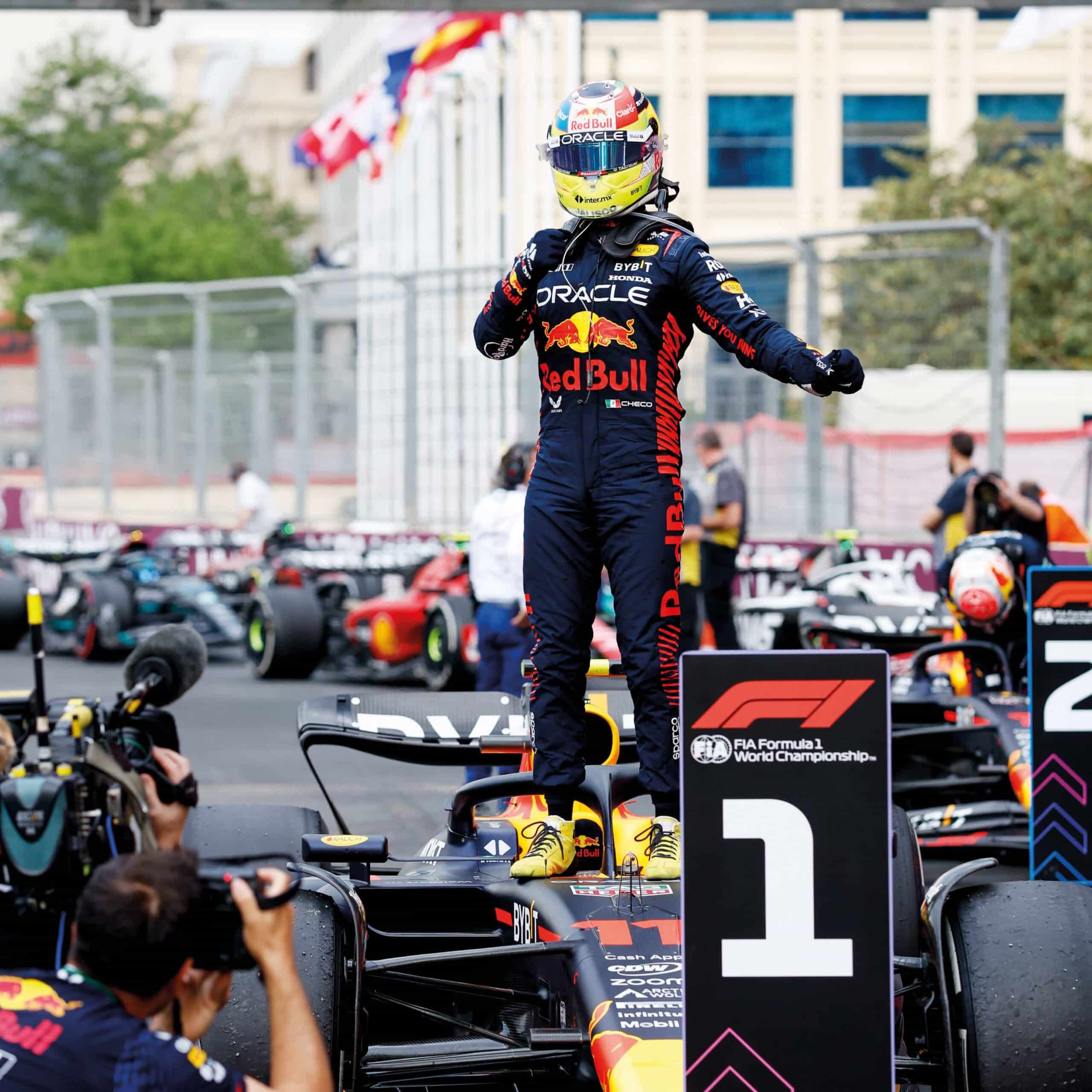 Sergio Pérez stands on car after Baku victory