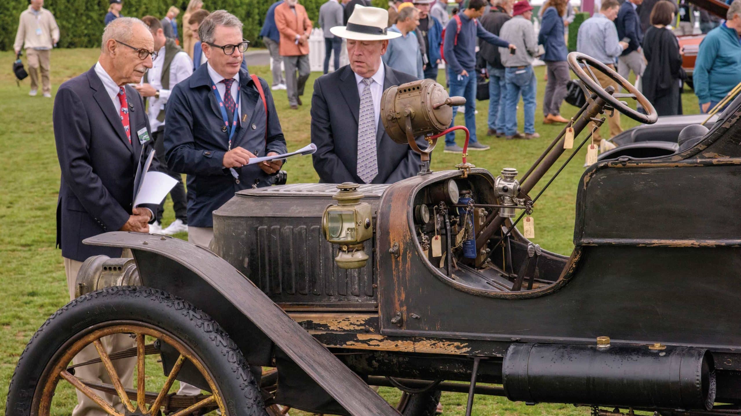 3 man judge old car