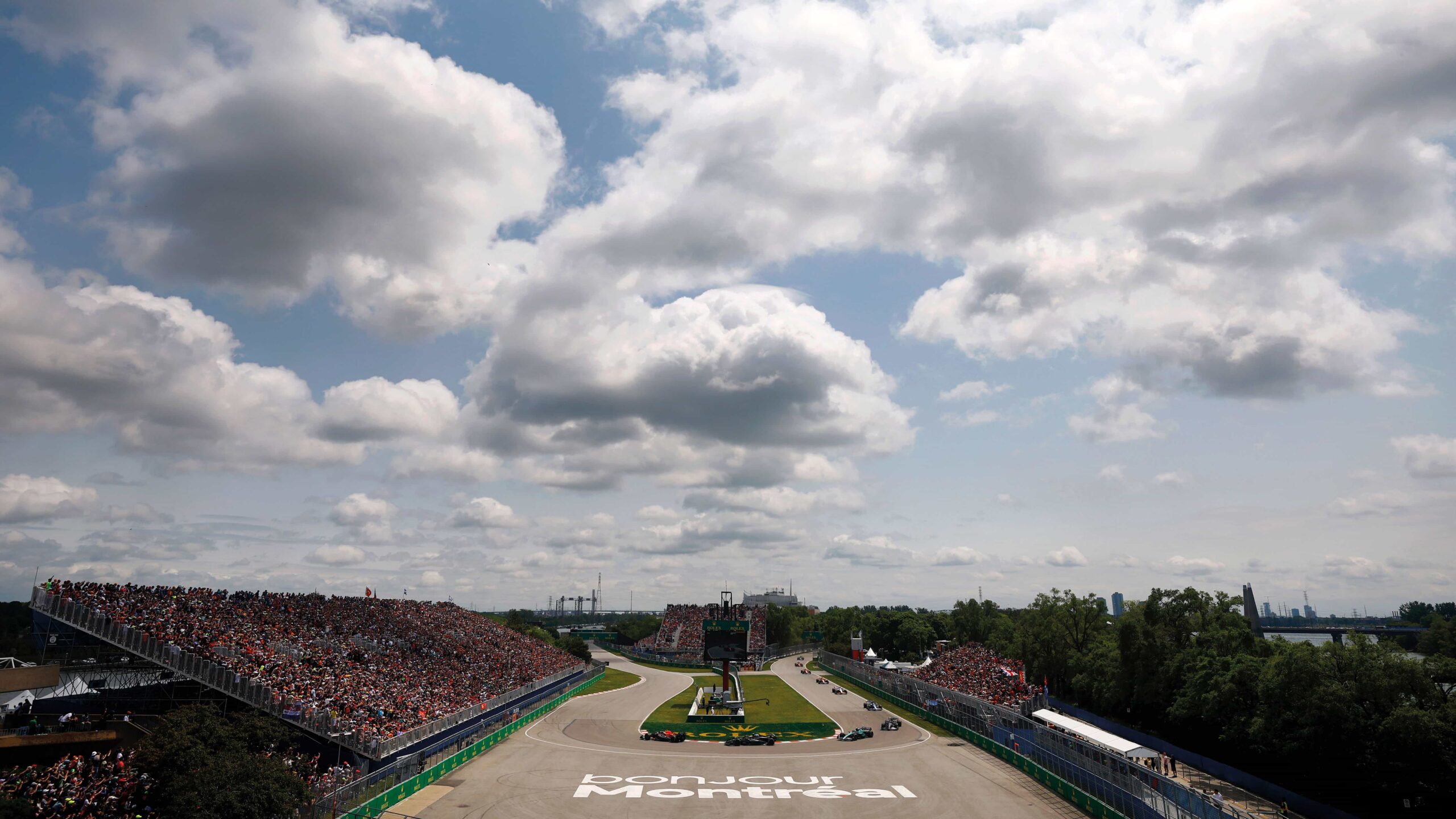Cars come round the corner at Montréal 2023
