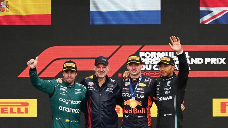 Fernando Alonso, Adrian Newey, Max Verstappen and Lewis Hamilton share a podium
