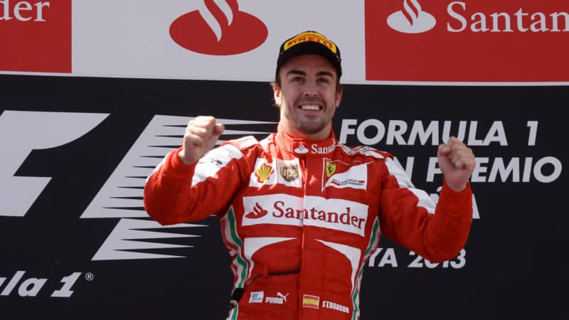 Fernando Alonso on the podium after winning 2013 Spanish GP