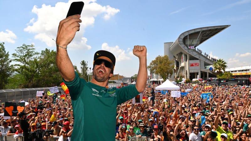 Fernando Alonso takes selfie in front of Barcelona crowd