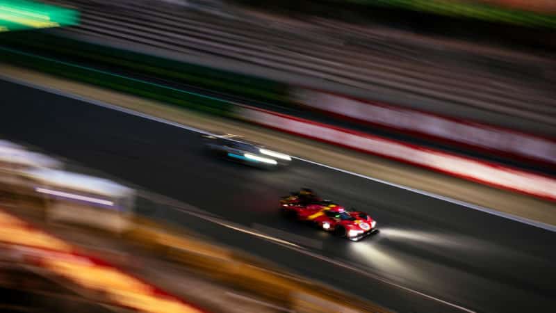 Ferrari Hypercar on Le Mans start finish straight at night in 2023