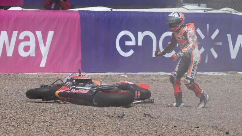 Marc Marquez next to crashed Honda MotoGP bike at Sachsenring 2023