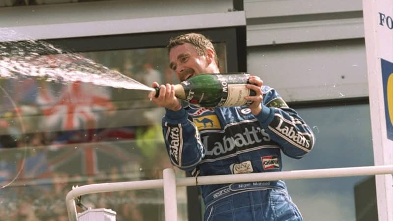 Mansell sprays champagne at Silverstone in 1992