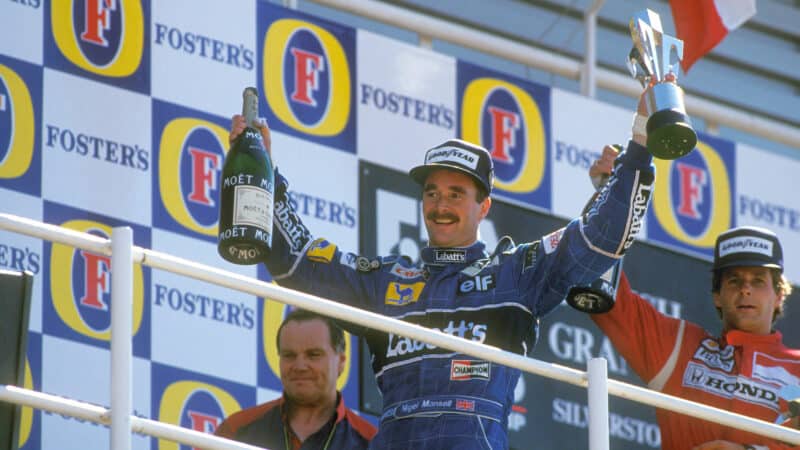 Patrick Head Nigel Mansell and Gerhard Berger on 1991 British Grand Prix podium