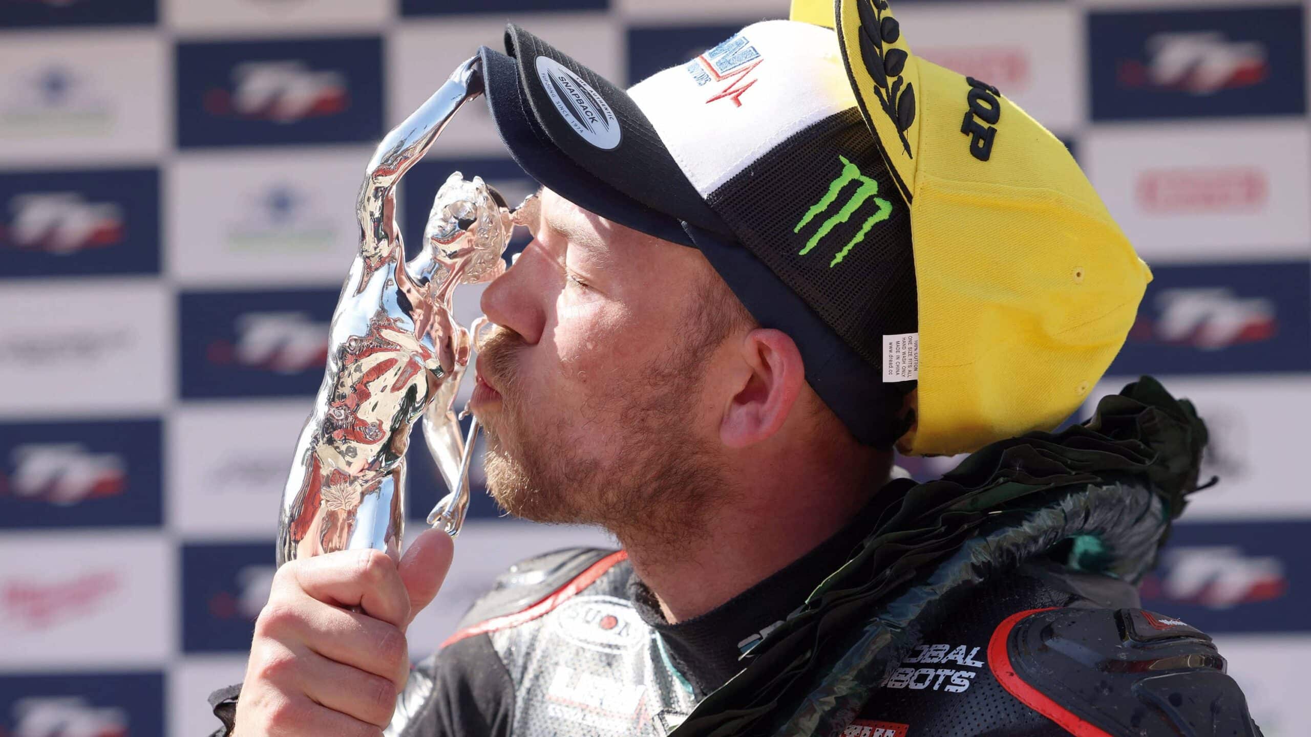 Peter Hickman kisses trophy