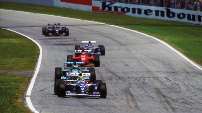 Senna leads Michael Schumacher and Gerhard Berger