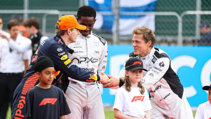 Brad Pitt shakes hands with Max Verstappen ahead of 2023 British Grand Prix