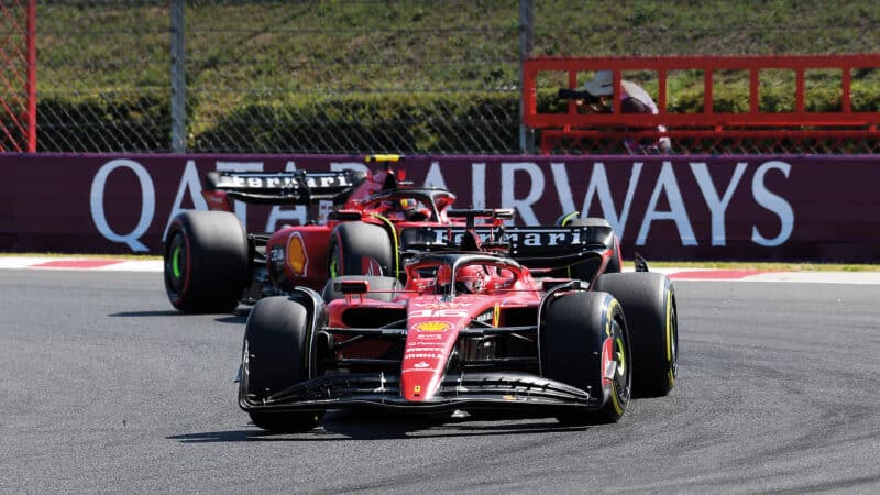 Charles Leclerc and Carlos Sainz battle on track