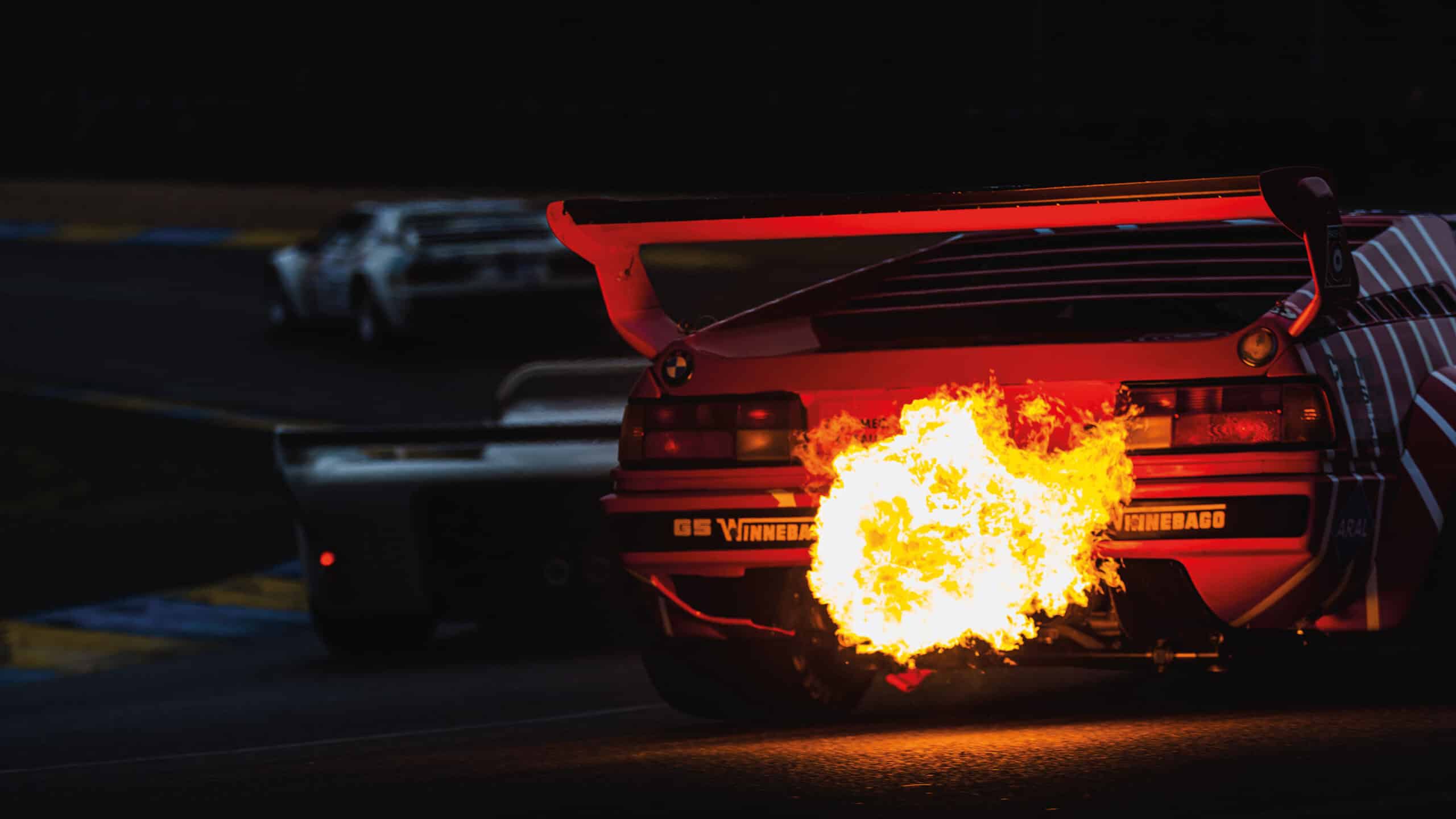 Flames burst from back of car