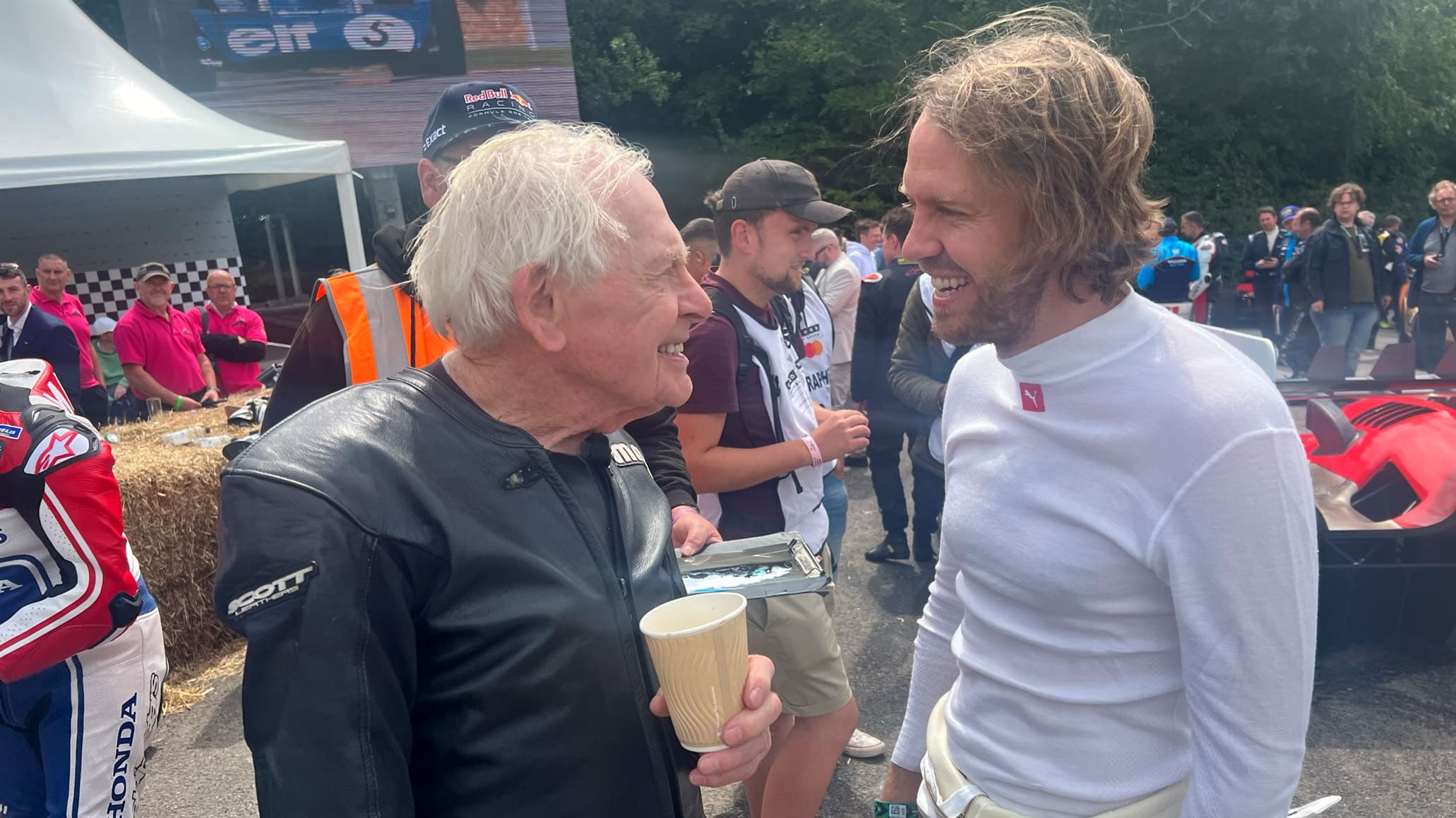 Sammy Miller with Sebastian Vettel at 2023 Goodwood Festival of Speed