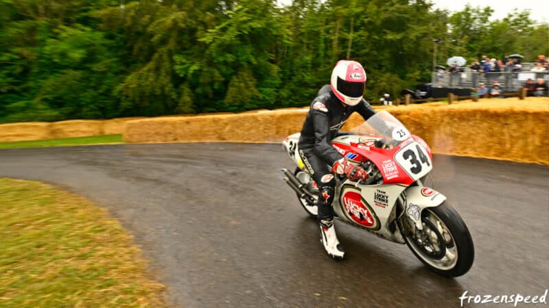 Mat Oxley on 500cc Suzuki GP bike at 2023 Goodwood Festival of Speed