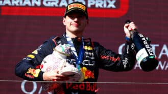 Verstappen makes F1 history look easy in Hungary with intense battle behind