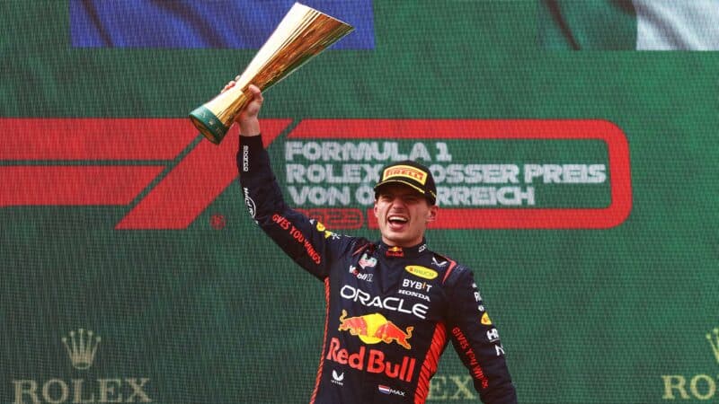 Max Verstappen lifts trophy after winnign 2023 Austrian Grand prix