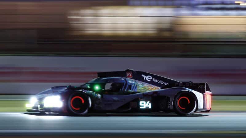 Peugeot’s 94 9X8 driving through the night at Le Mans