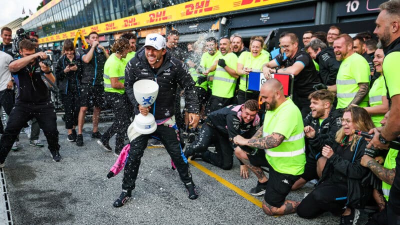 Alpine team sprays Pierre Gasly with champagne after 2023 Dutch GP F1 podium finish