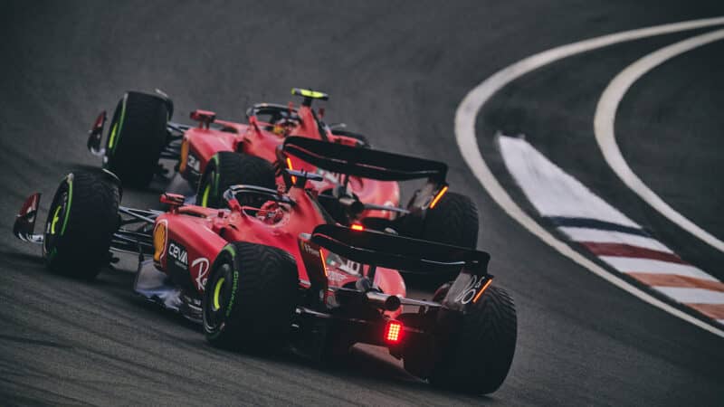 Both Ferrari F1 cars on Zandvoort banking in 2023 Dutch Grand Prix