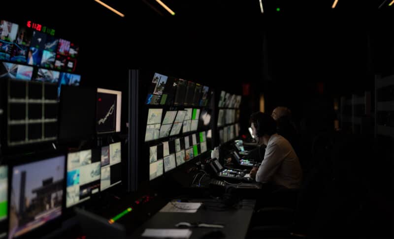 Bank of screens showing F1 TV feeds