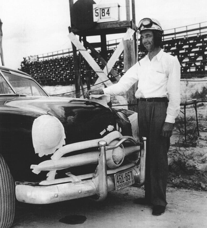 Herb-Thomas-with-1949-Ford-he-raced-in-NASCAR-1949-Daytona-Beach-race