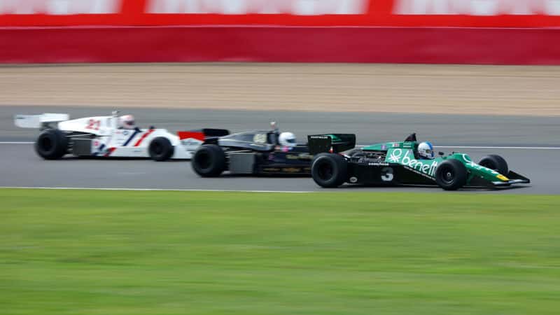 Historic F1 cars in a line at 2023 Silverstone Festival