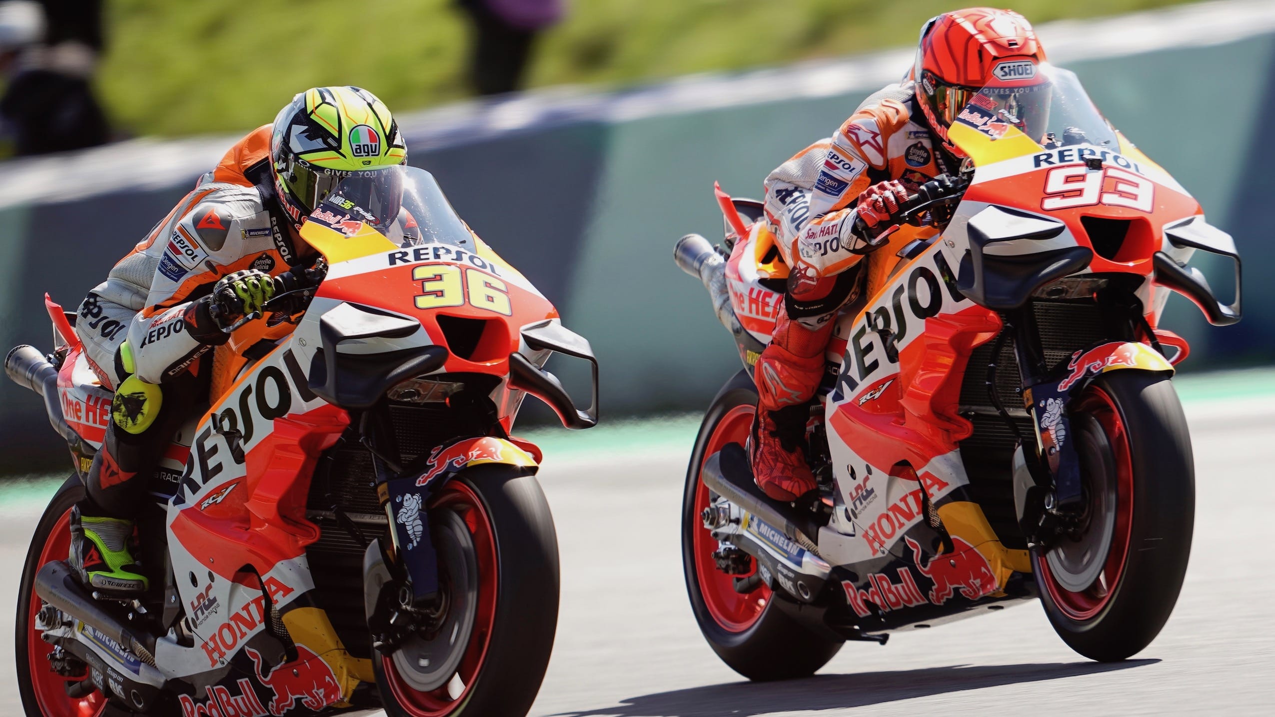 Joan Mir alongside Marc Marquez in 2023 MotoGP Austrian GP