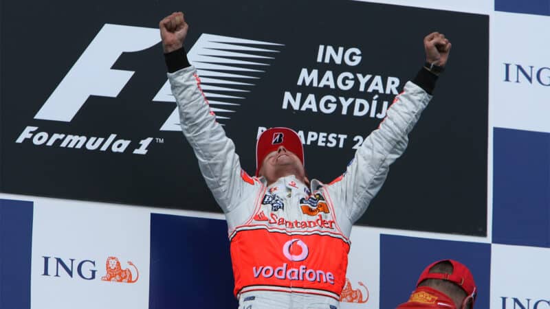 Heikki Kovalainen celebrates victory in podium in 2008 Hungarian GP