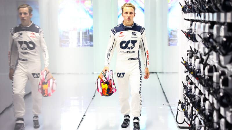Liam Lawson walks through alphaTauri F1 garage at 2023 Dutch Grand Prix