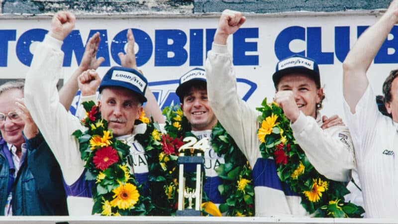 Nielsen Cobb and Brundle on the podium after winning 1990 Le Mans 24 Hours